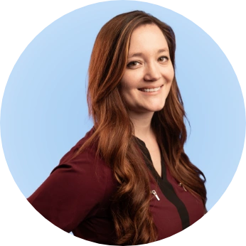 Headshot of Jenna Bradford, Director of User Experience of the best tech consulting firm from the shoulders up smiling in business attire